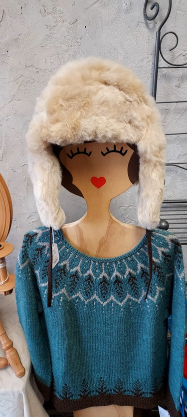 Sweaters, blankets, capes, ruanas, etc.